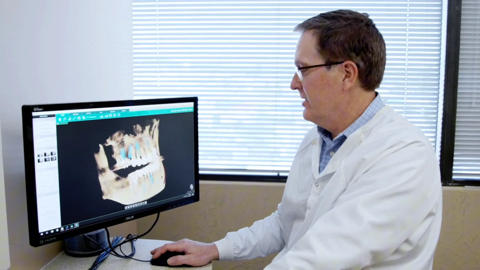 Dr. Steven Haywood reviewing a 3D CT scan